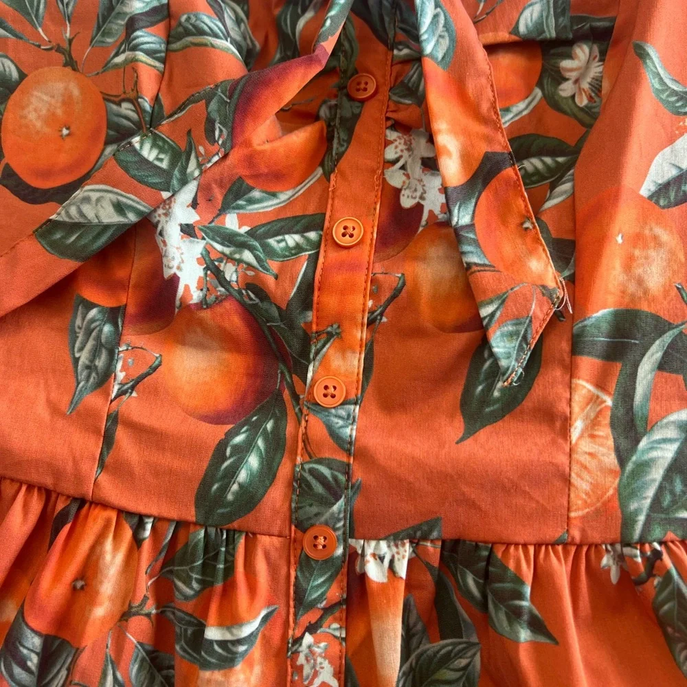 Torrid Orange Fruit themed Floral Peplum Top - Picture 2 of 4